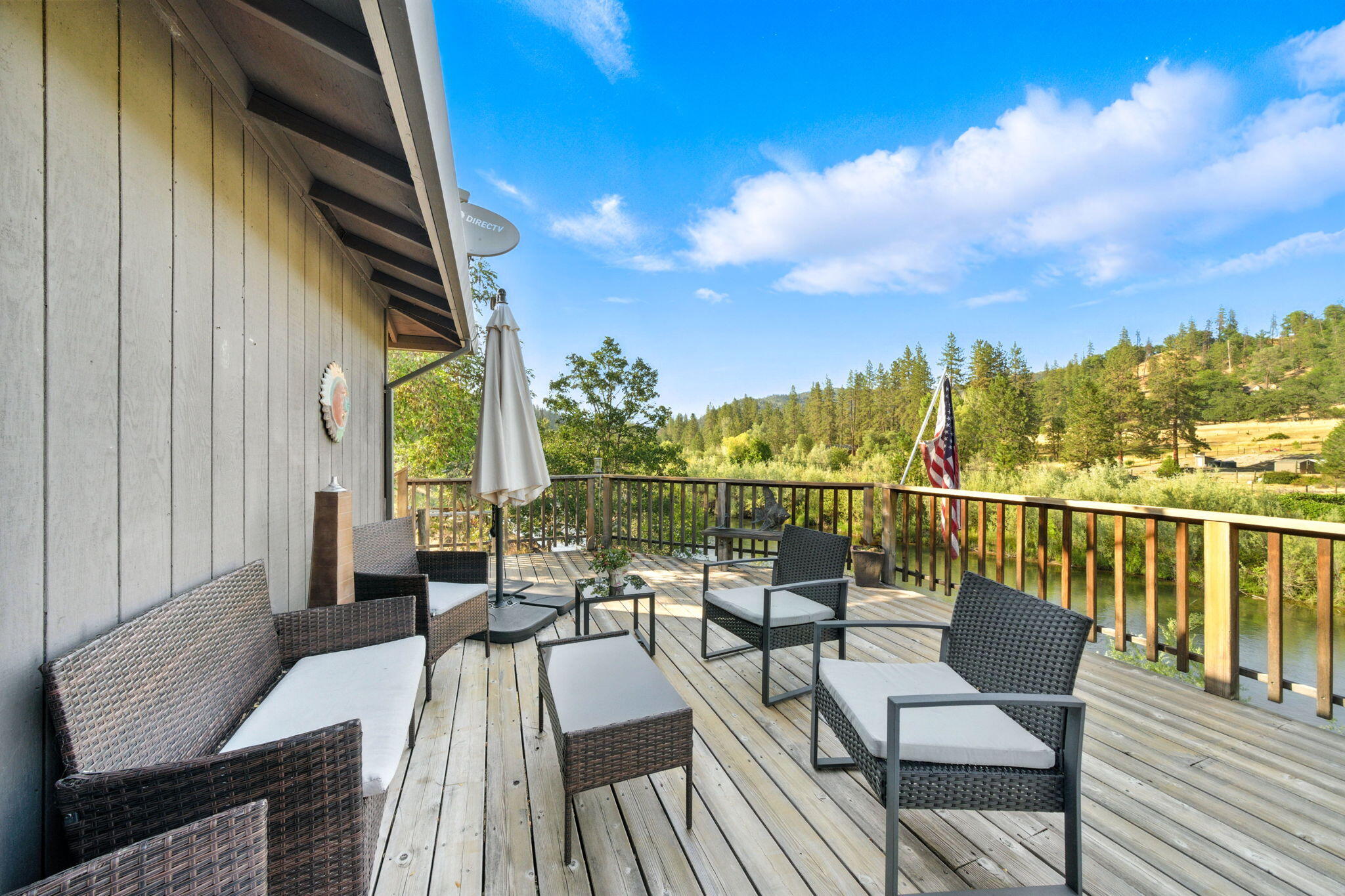61 Chief George Lewiston, CA 96052 - Photo 47 of 101 a view of a balcony with wooden floor and outdoor seating