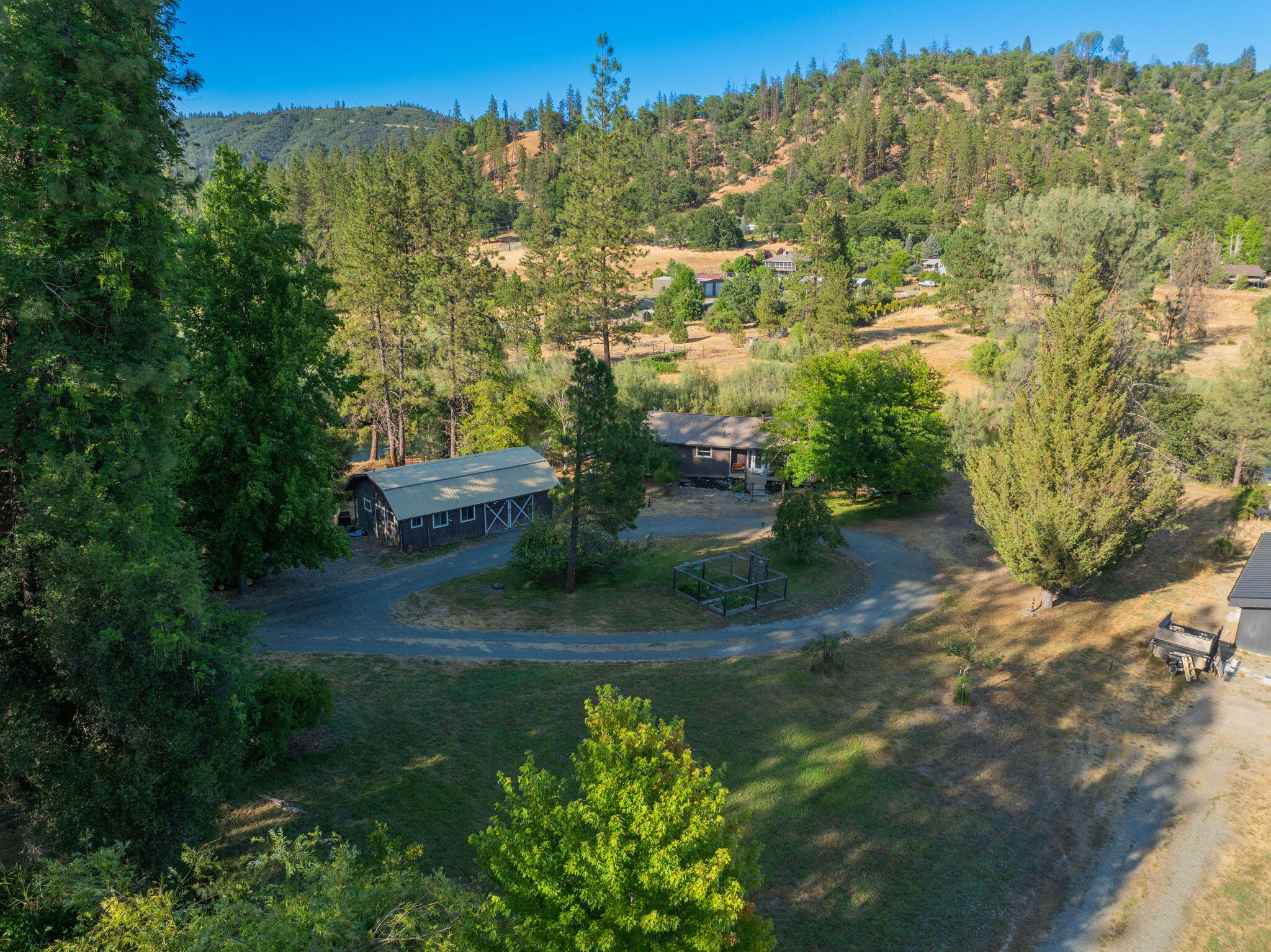 61 Chief George Lewiston, CA 96052 - Photo 61 of 101 a view of a yard with plants and a building view