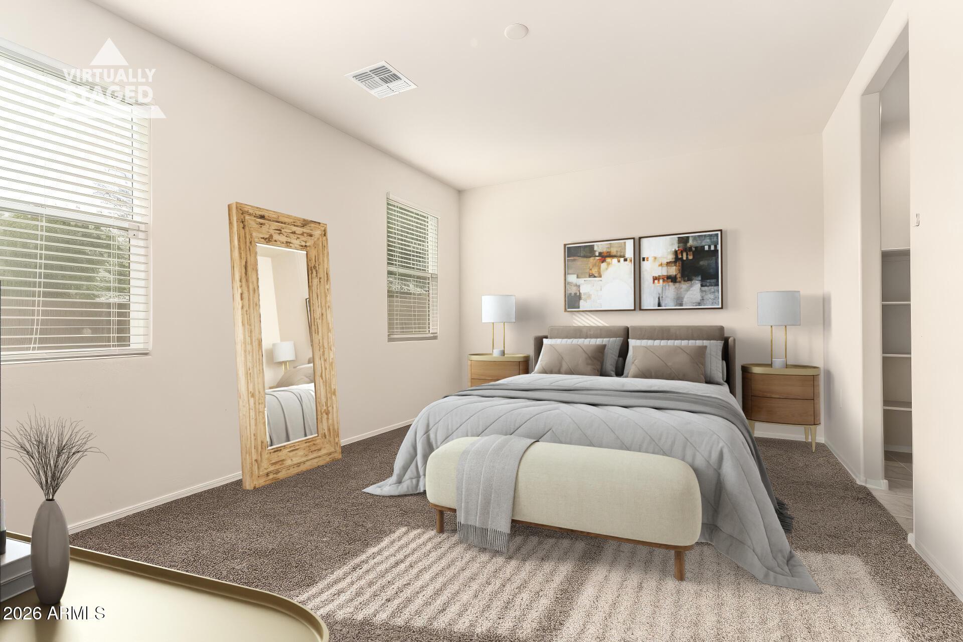 5065 East Emery Road San Tan Valley, AZ 85143 - Photo 12 of 33 a bedroom with a bed and wooden floor