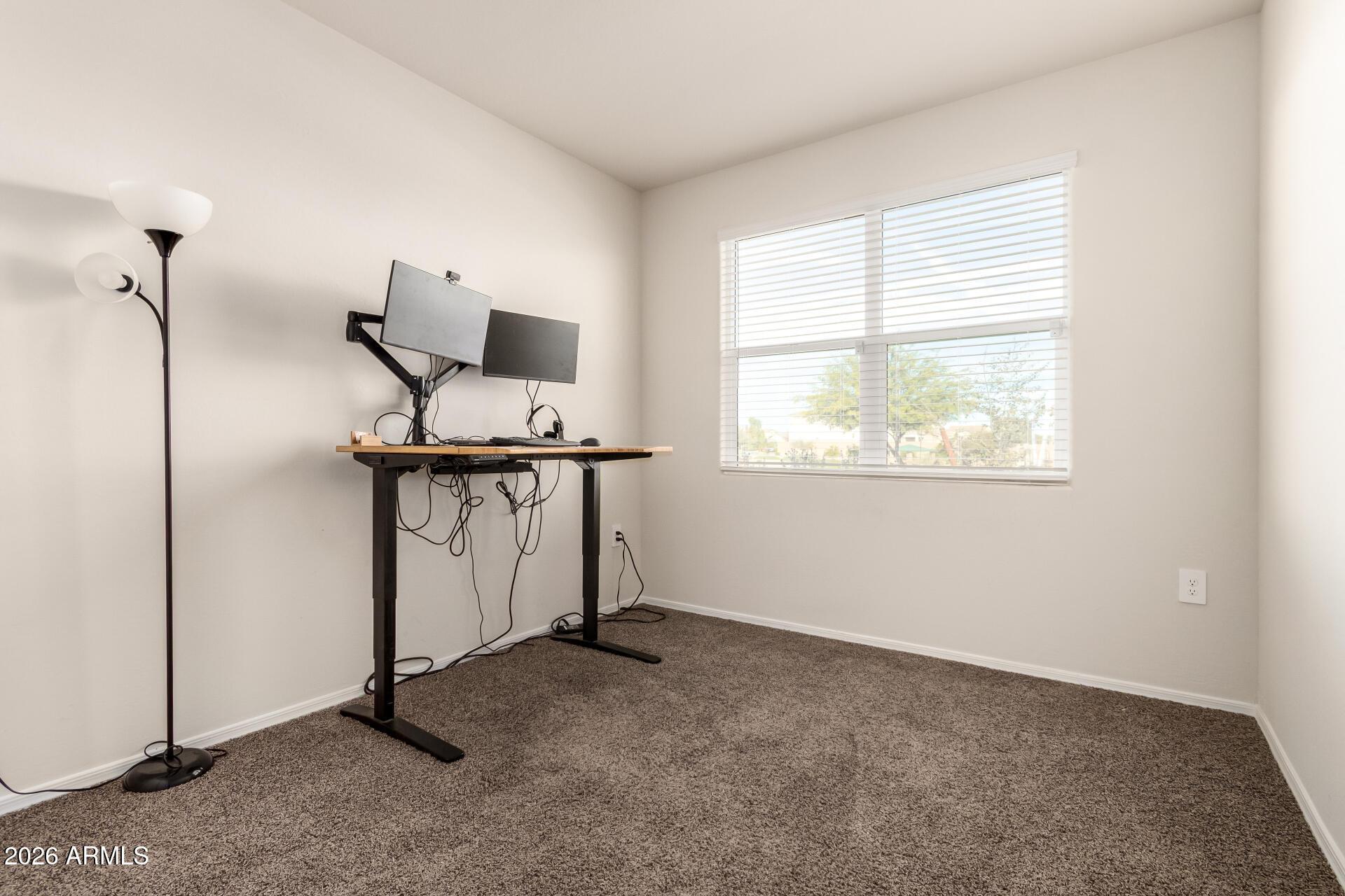 5065 East Emery Road San Tan Valley, AZ 85143 - Photo 15 of 33 a view of empty room with windows