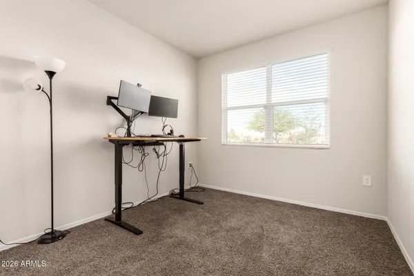 a view of empty room with windows