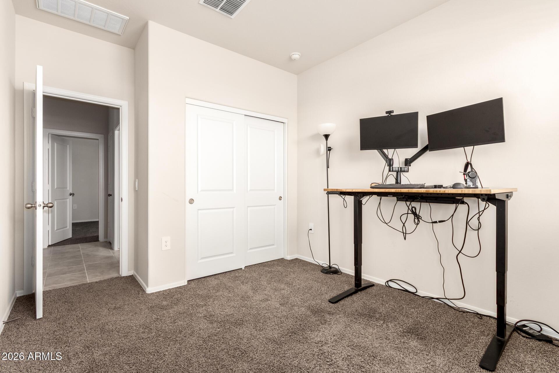 5065 East Emery Road San Tan Valley, AZ 85143 - Photo 16 of 33 a view of entryway with wooden floor