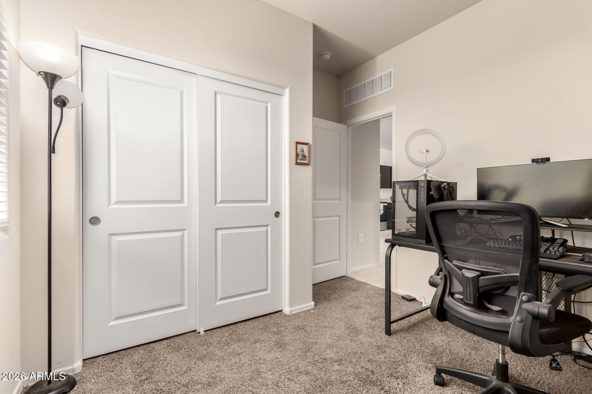 5065 East Emery Road San Tan Valley, AZ 85143 - Photo 20 of 33 a view of a workspace with furniture