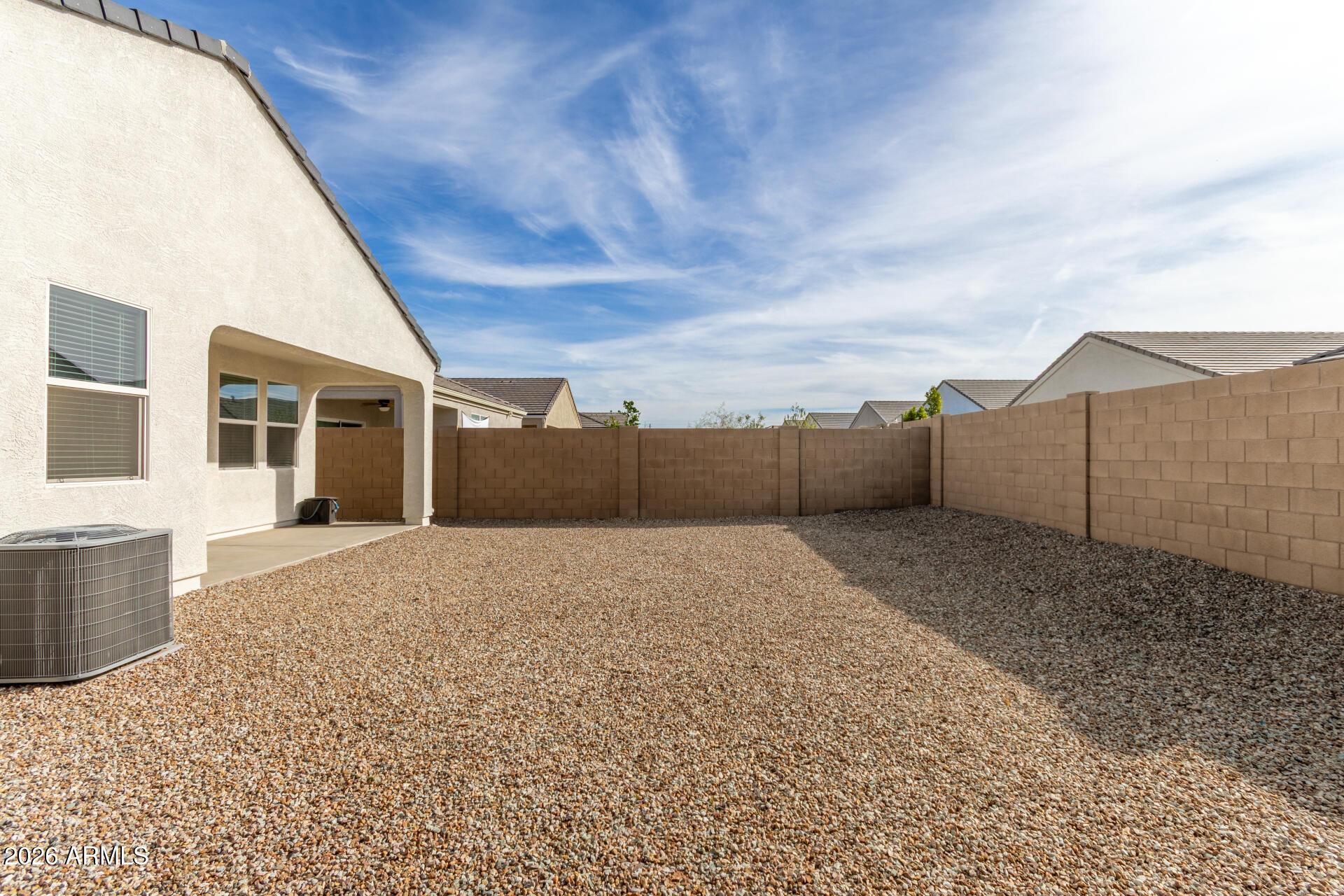 5065 East Emery Road San Tan Valley, AZ 85143 - Photo 28 of 33 a view of backyard of house