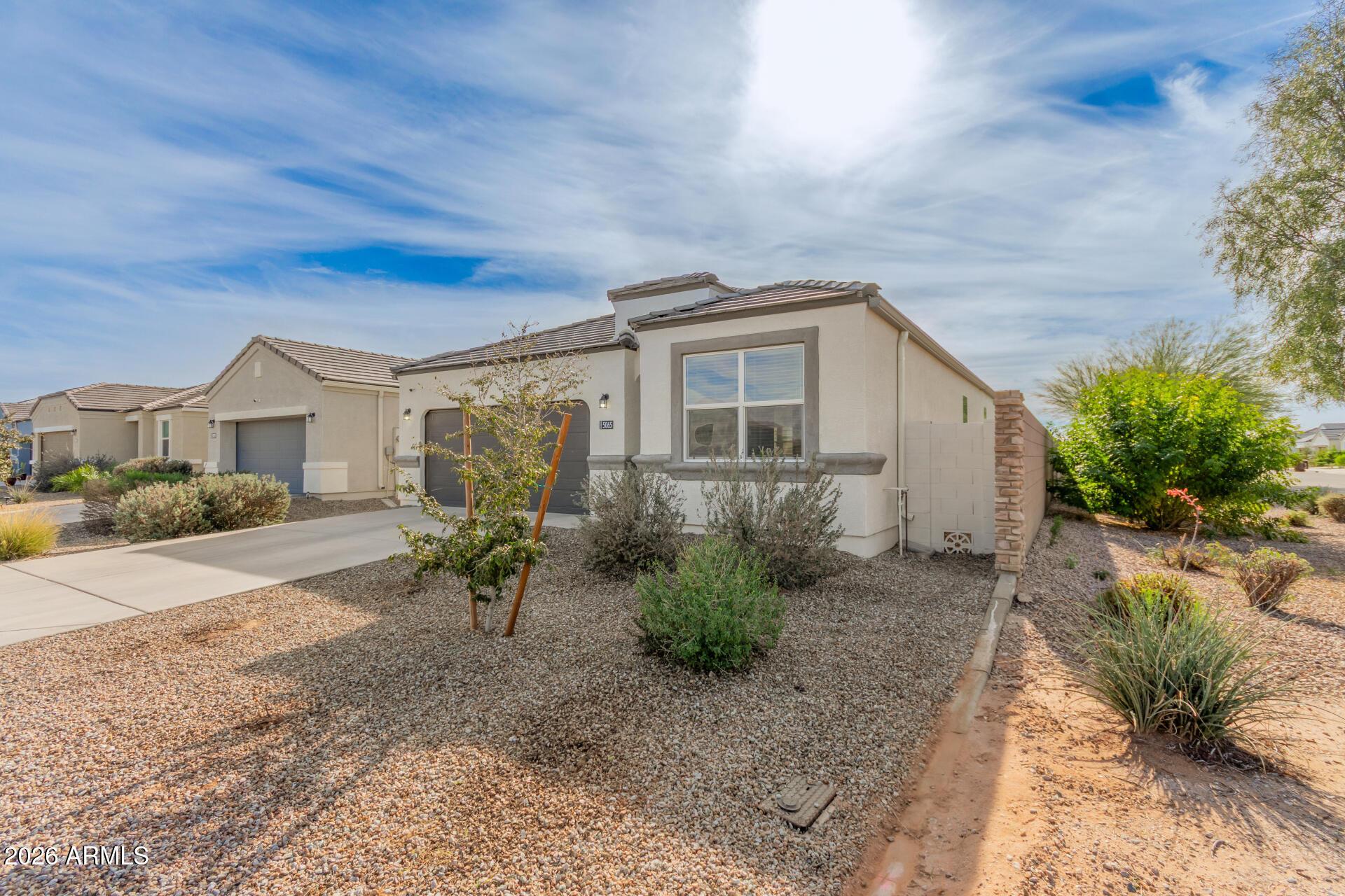 5065 East Emery Road San Tan Valley, AZ 85143 - Photo 33 of 33 a view of a house with a patio