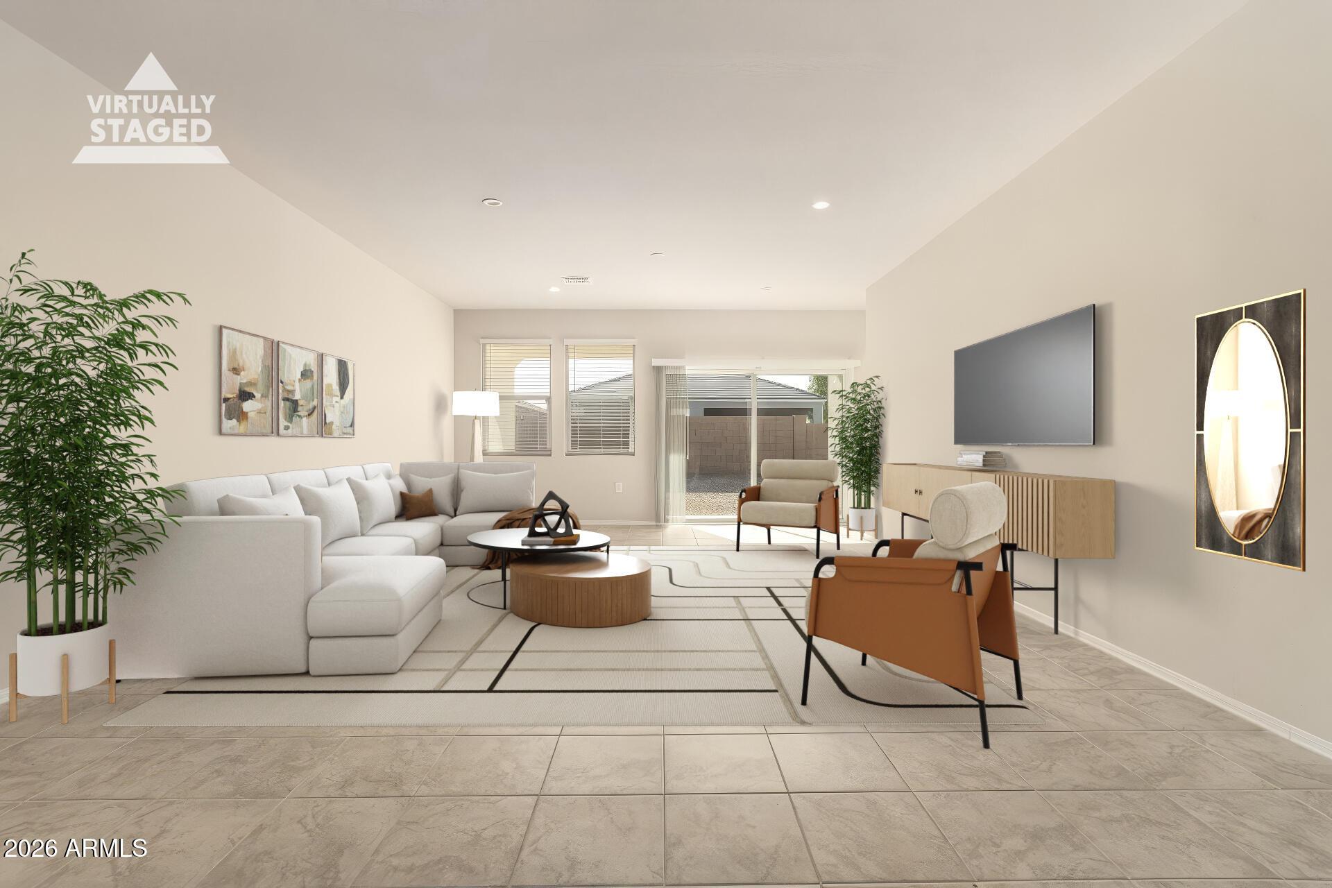 5065 East Emery Road San Tan Valley, AZ 85143 - Photo 4 of 33 a living room with furniture and a large window