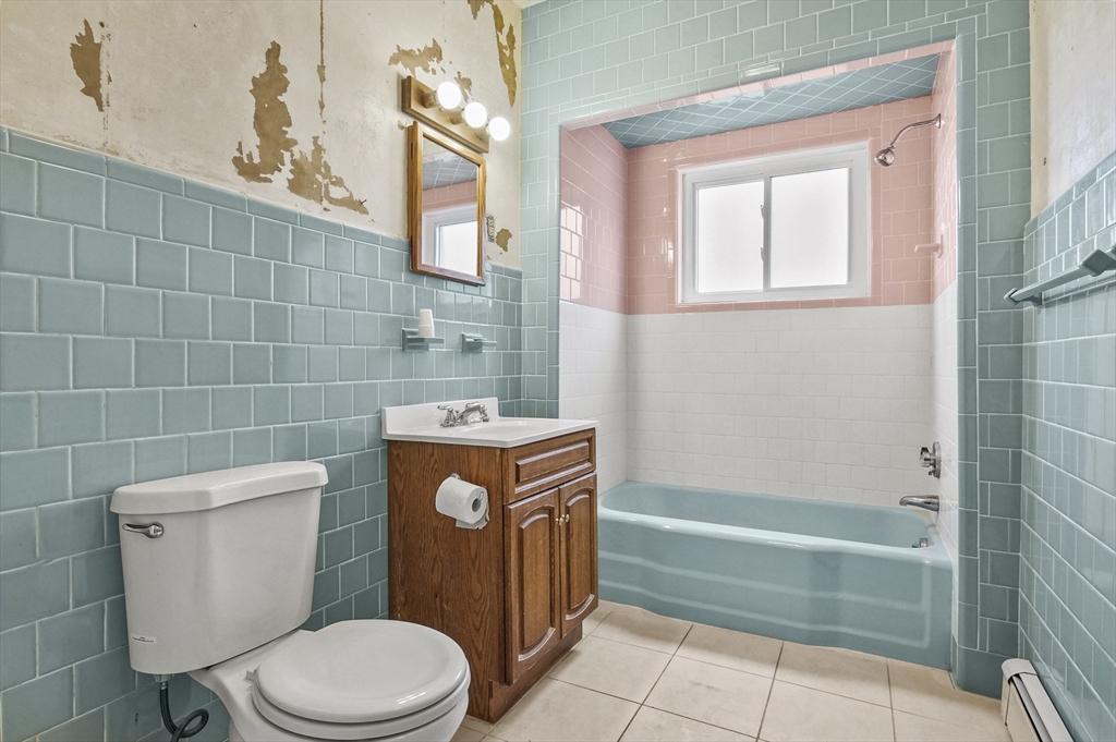 3 Clearview Avenue Worcester, MA 01605 - Photo 23 of 42 a bathroom with a toilet a sink and bathtub