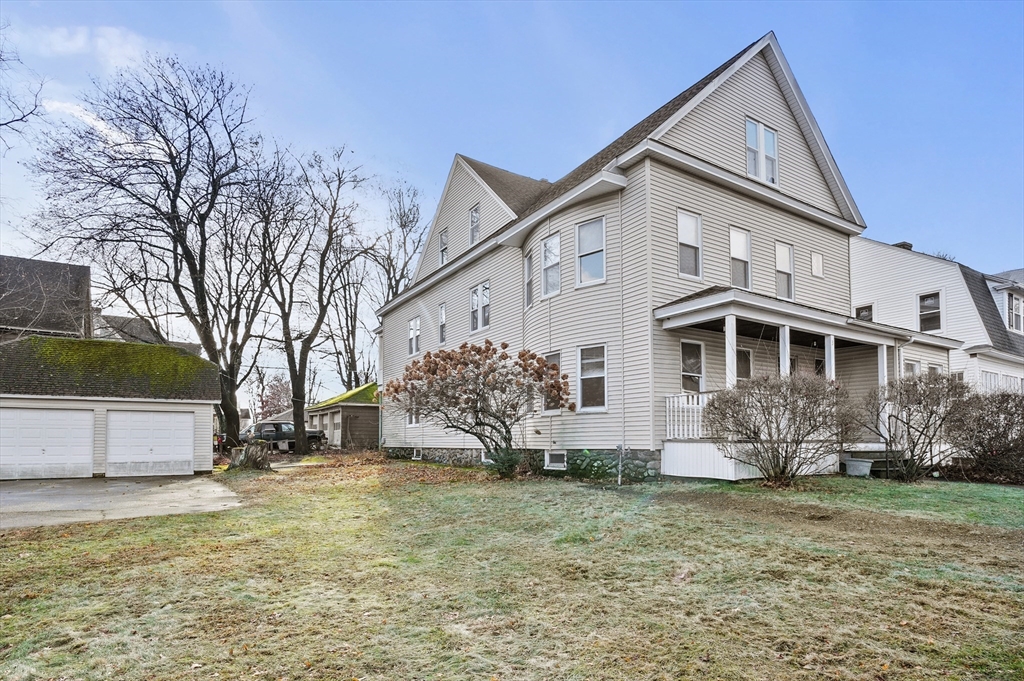 3 Clearview Avenue Worcester, MA 01605 - Photo 3 of 42 a view of a white house with a yard