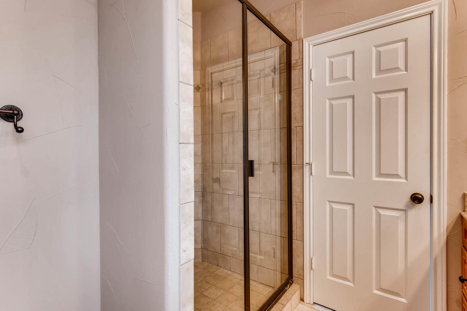 906 Juniper Street Austin, TX 78702 - Photo 18 of 28 a view of a bathroom with a shower