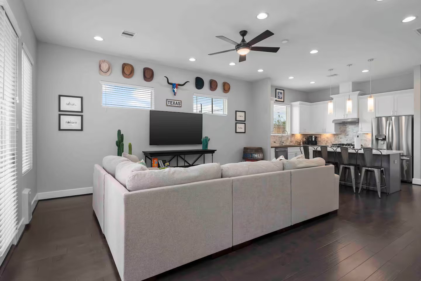 4202 Gillespie Street, Unit A Houston, TX 77020 - Photo 7 of 20 a living room with furniture and a flat screen tv