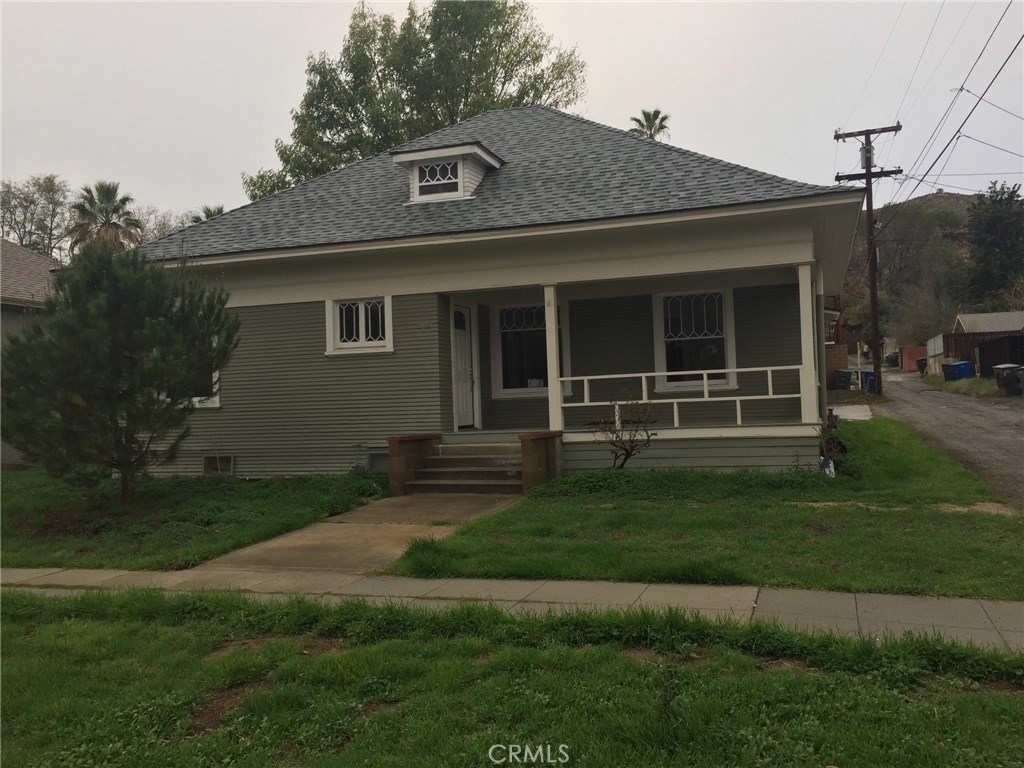 4063 Pine Street Riverside, CA 92501 - Photo 1 of 1 a view of a house with a garden