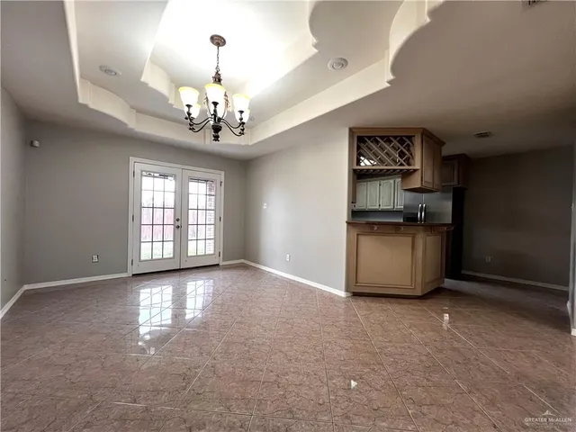 a kitchen with stainless steel appliances granite countertop a stove sink and cabinets