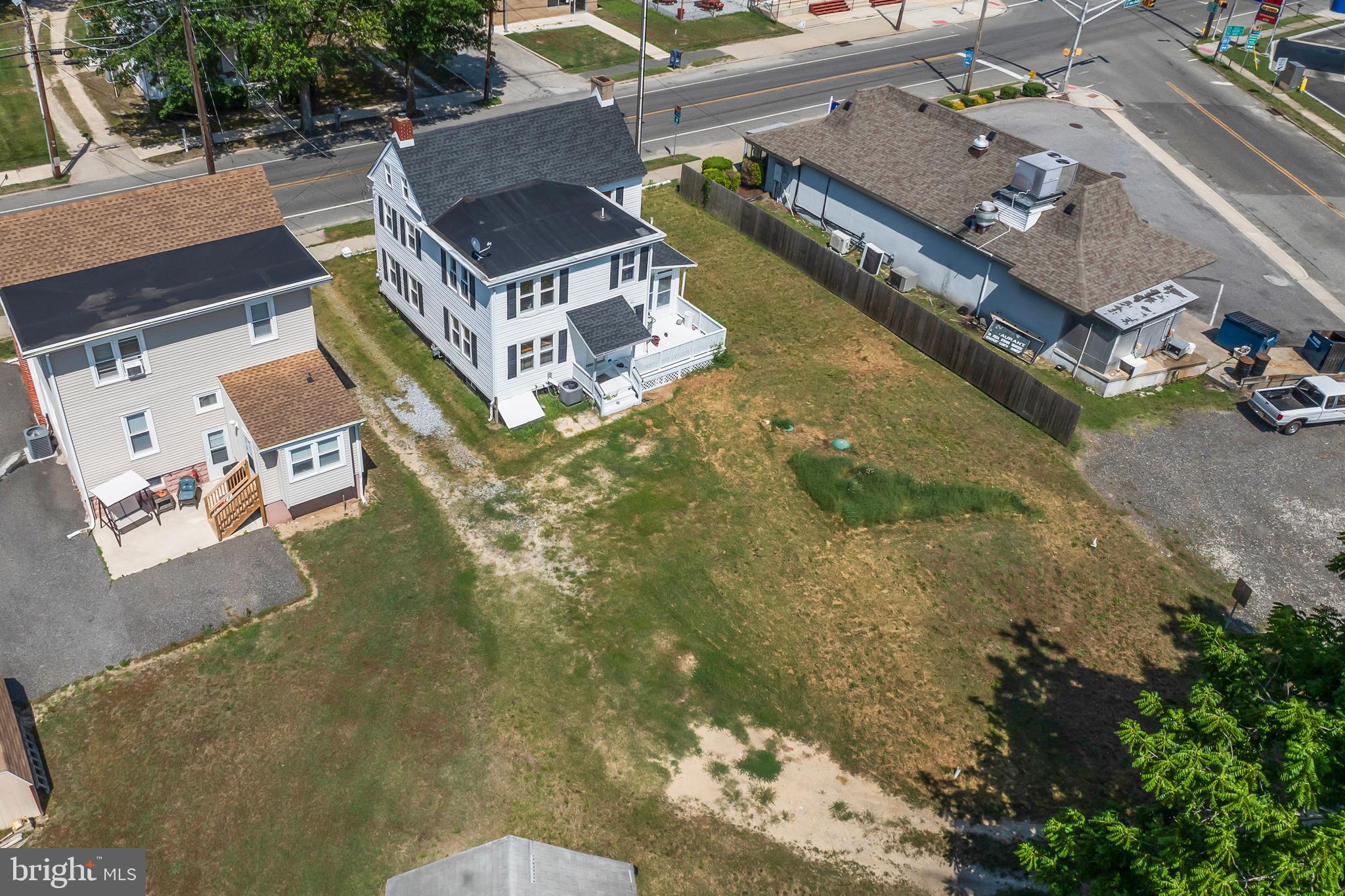 348 Main Street Cedarville, NJ 08311 - Photo 4 of 9 an aerial view of residential houses with outdoor space