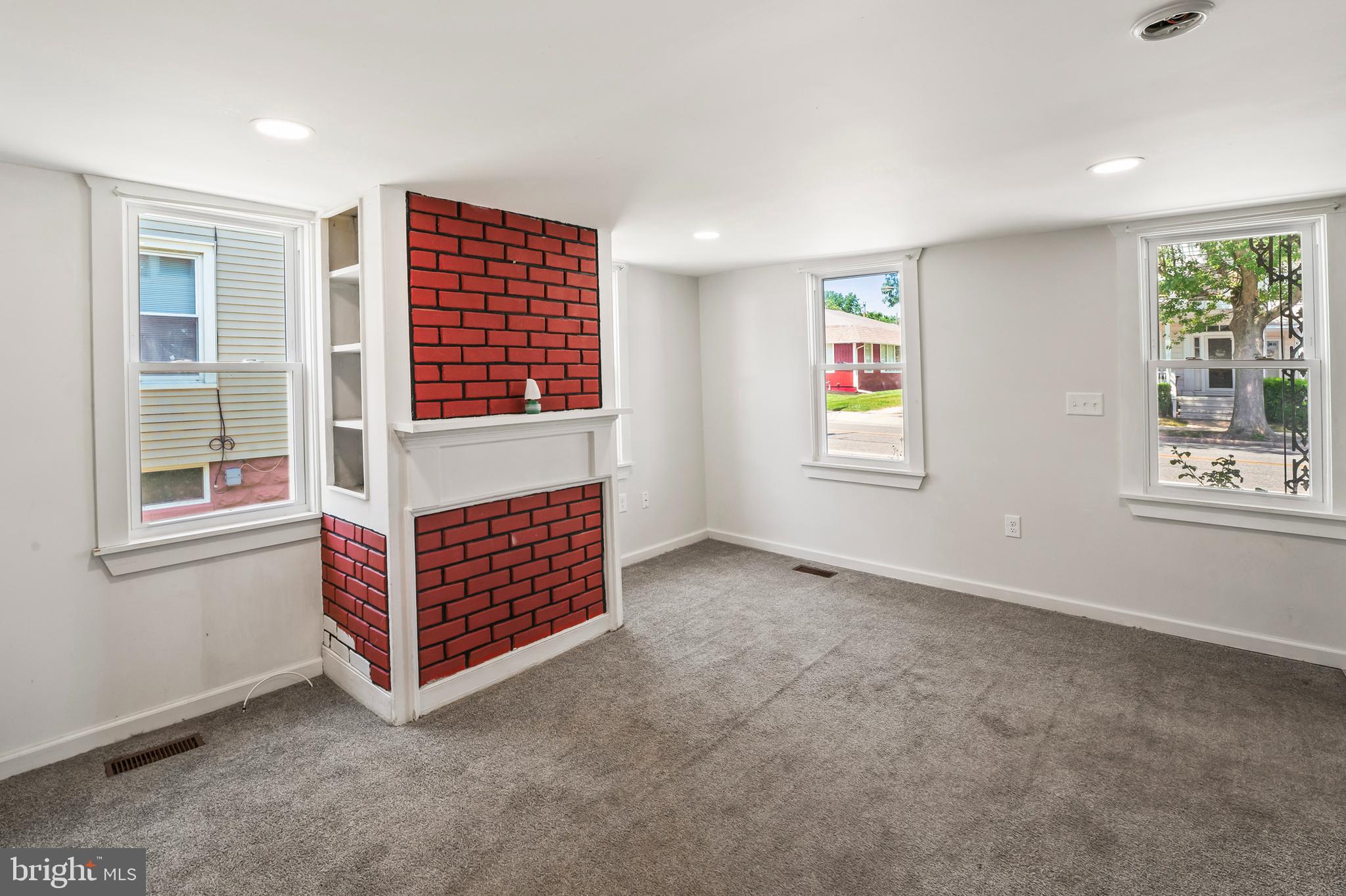 348 Main Street Cedarville, NJ 08311 - Photo 7 of 9 a view of an empty room with a window