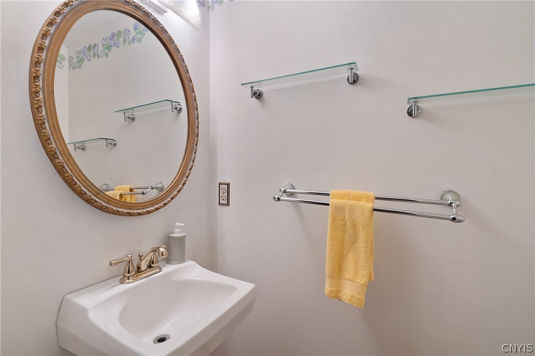 5984 Darby Road Cicero, NY 13039 - Photo 7 of 43 1st floor half bathroom