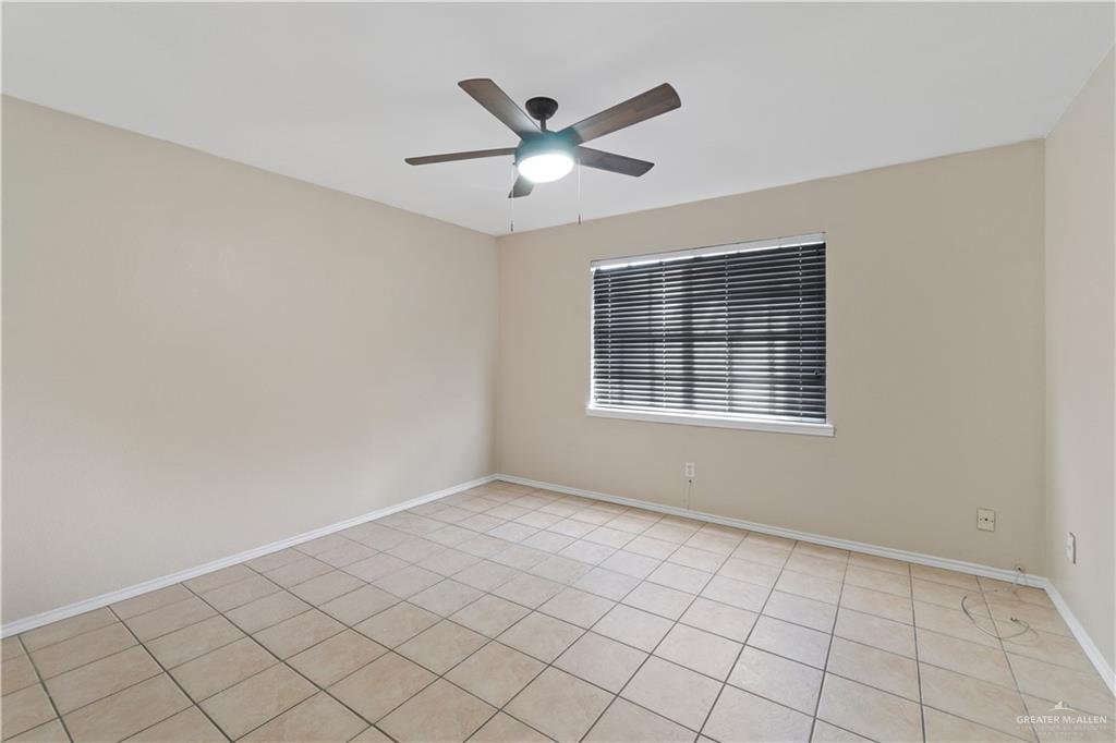 7412 North 19th Street McAllen, TX 78504 - Photo 11 of 22 a view of an empty room with a window