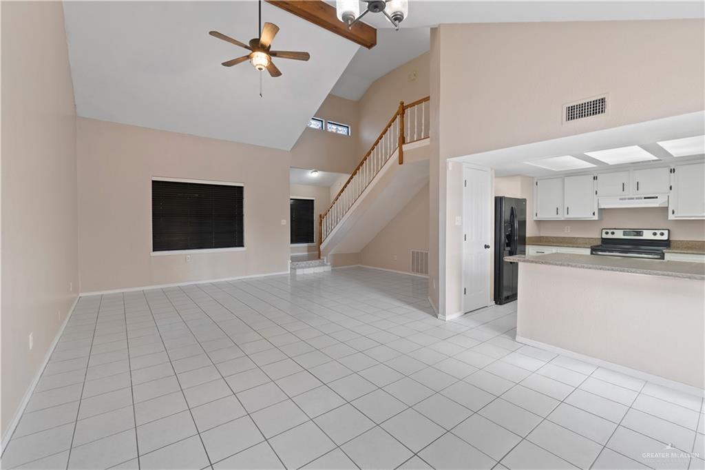 7412 North 19th Street McAllen, TX 78504 - Photo 5 of 22 a view of kitchen with microwave and cabinets