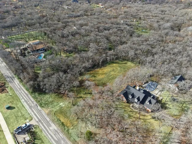 an aerial view of residential house with beach