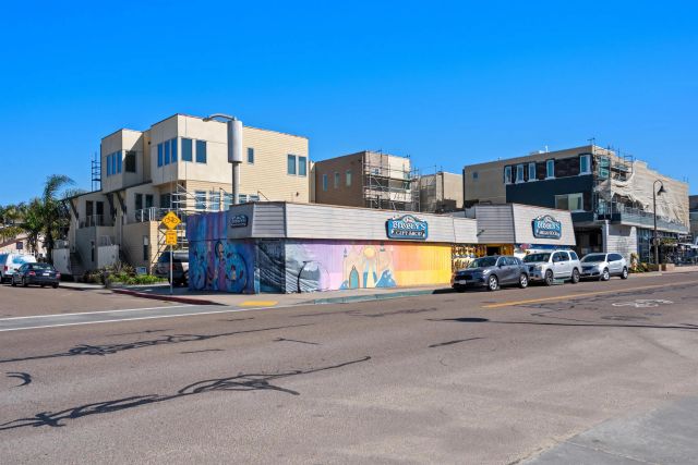 a view of a street with cars