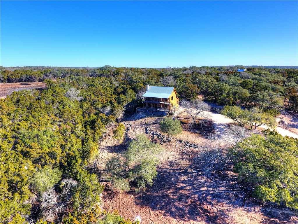 2701 Fm 3237 Wimberley, TX 78676 - Photo 1 of 1 a view of a lake with lawn chairs