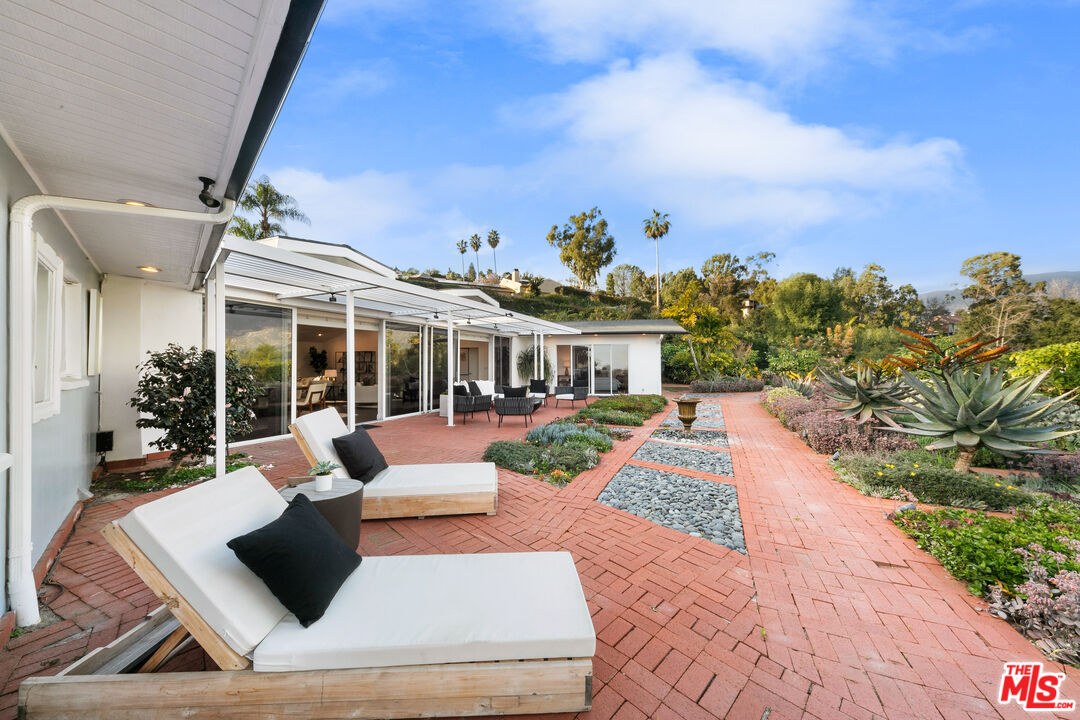 1820 Braemar Road Pasadena, CA 91103 - Photo 16 of 75 a view of a house with backyard porch and furniture