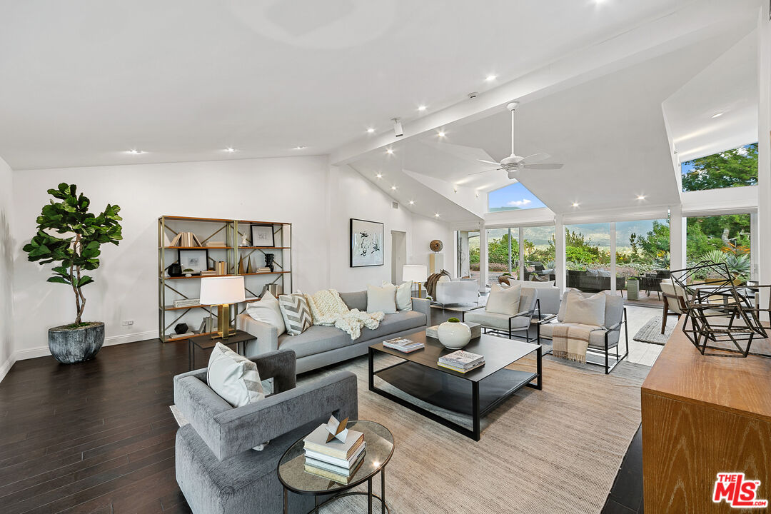 1820 Braemar Road Pasadena, CA 91103 - Photo 28 of 75 a living room with furniture and a large window