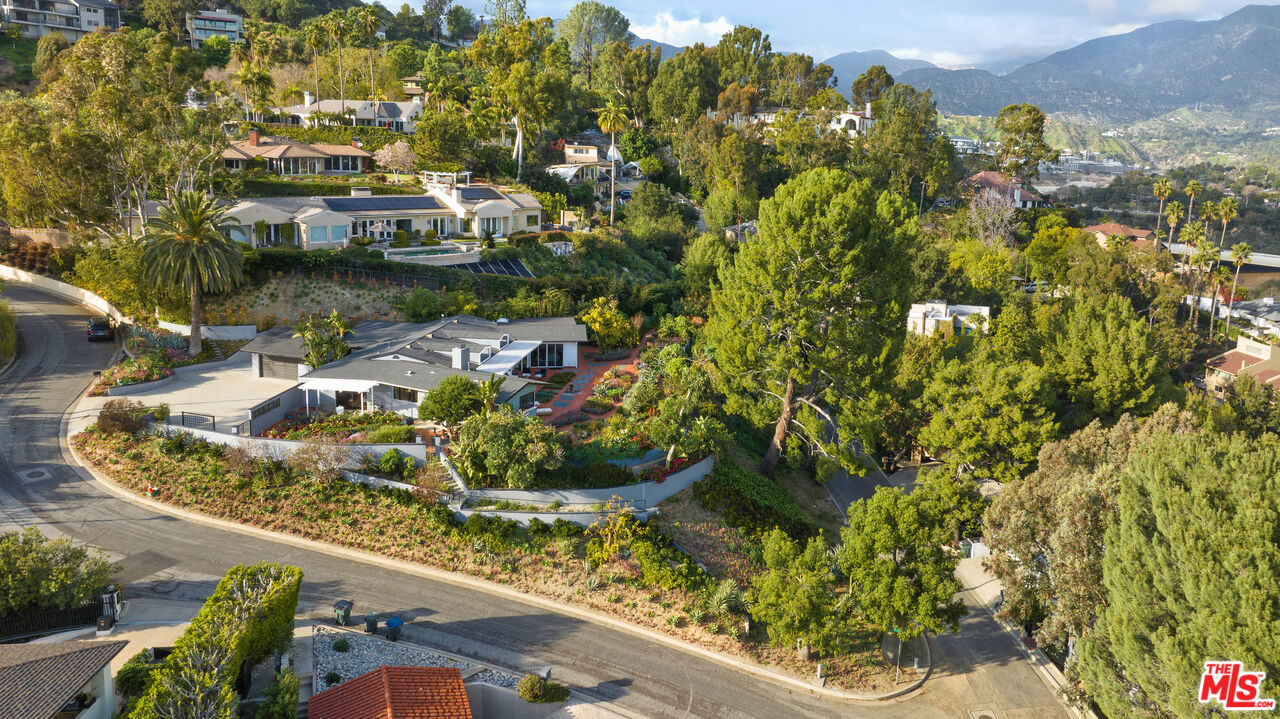 1820 Braemar Road Pasadena, CA 91103 - Photo 58 of 75 a view of a lake with a house