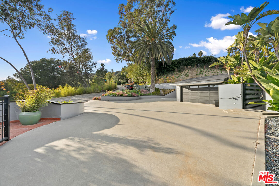 1820 Braemar Road Pasadena, CA 91103 - Photo 8 of 75 a view of a swimming pool with a patio