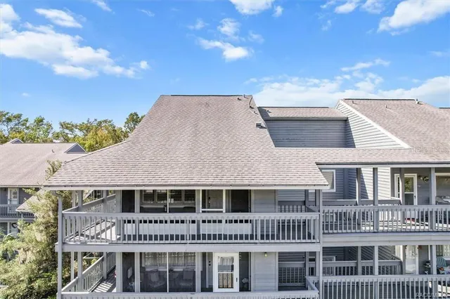 a view of balcony with wooden floor