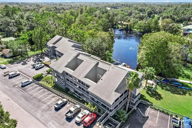 an aerial view of a house with outdoor space
