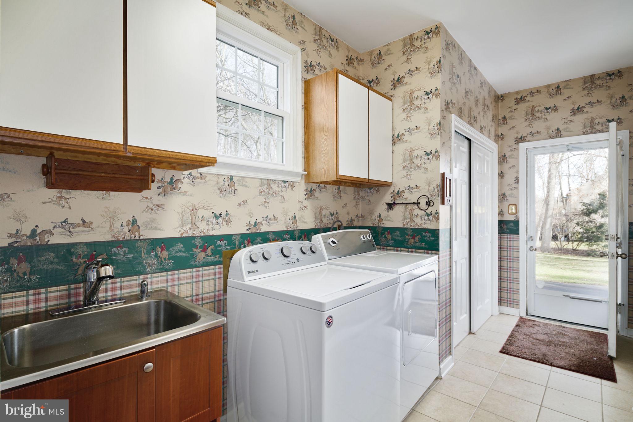 6028 Goshen Road Newtown Square, PA 19073 - Photo 13 of 32 1st floor washer/dryer, sidexit to driveway/garage