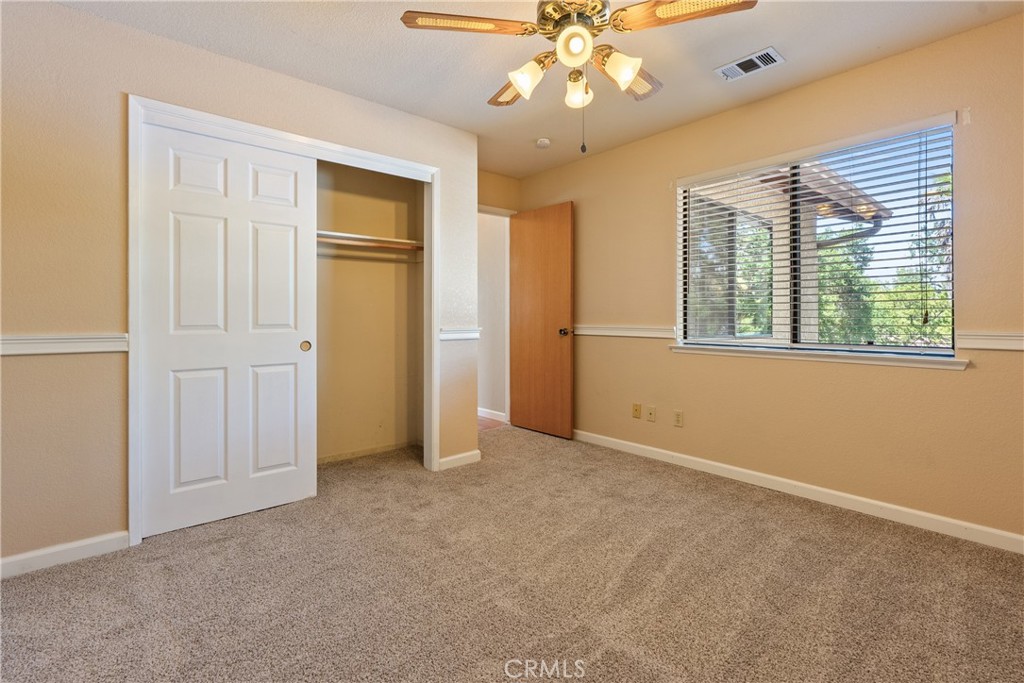 6815 Santa Lucia Road, Unit 5 Atascadero, CA 93422 - Photo 30 of 44 New carpet and a standard reach in closet welcomes you into bedroom 3.