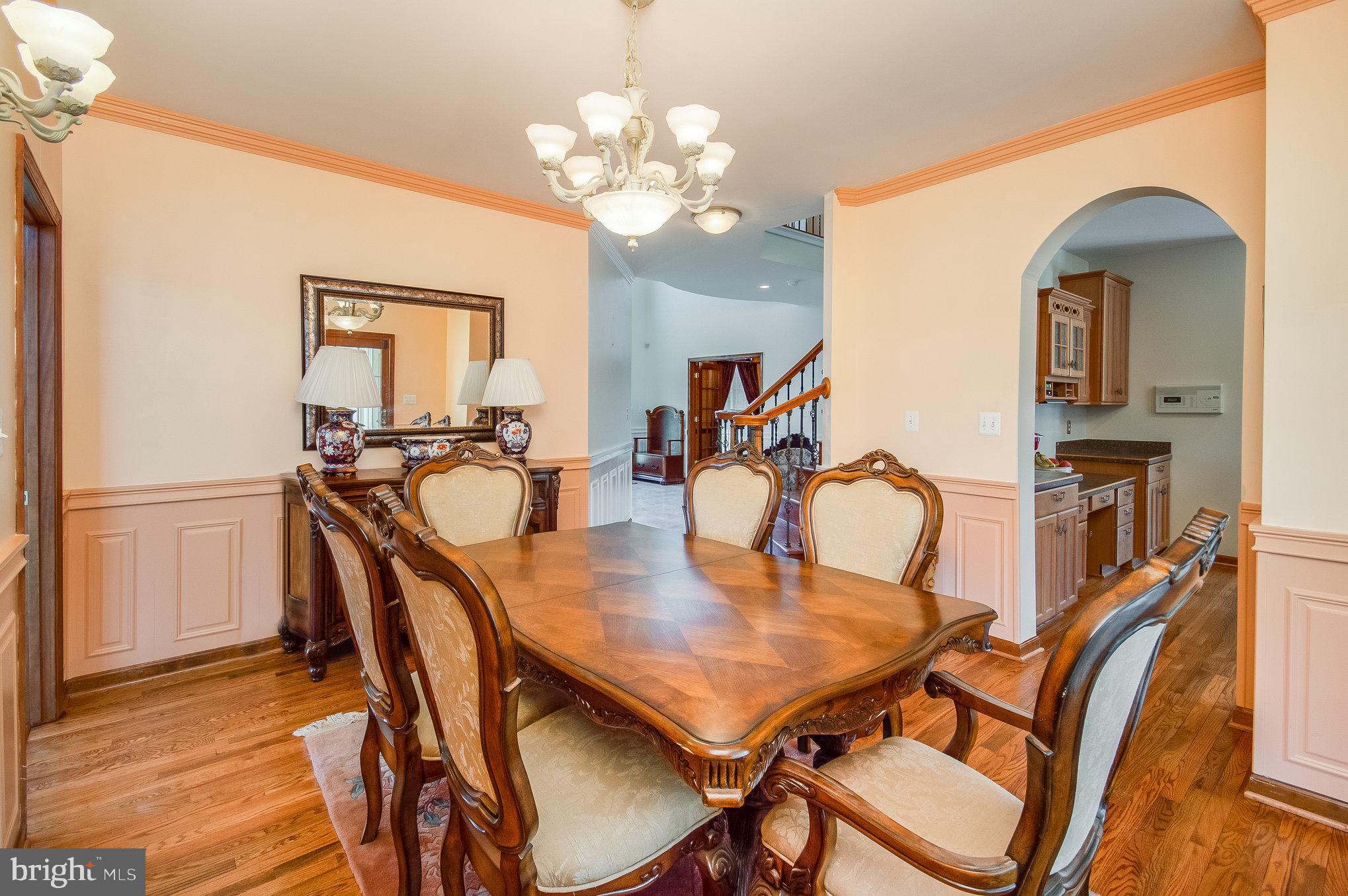 11425 Custers Trace Spotsylvania, VA 22553 - Photo 11 of 60 a view of a dining room with furniture and wooden floor