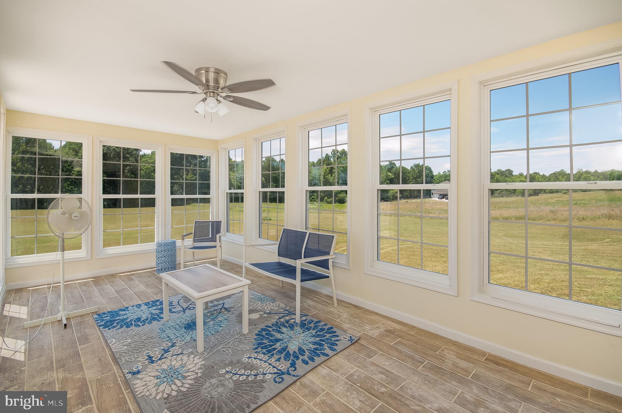 11425 Custers Trace Spotsylvania, VA 22553 - Photo 18 of 60 a living room with furniture and a window