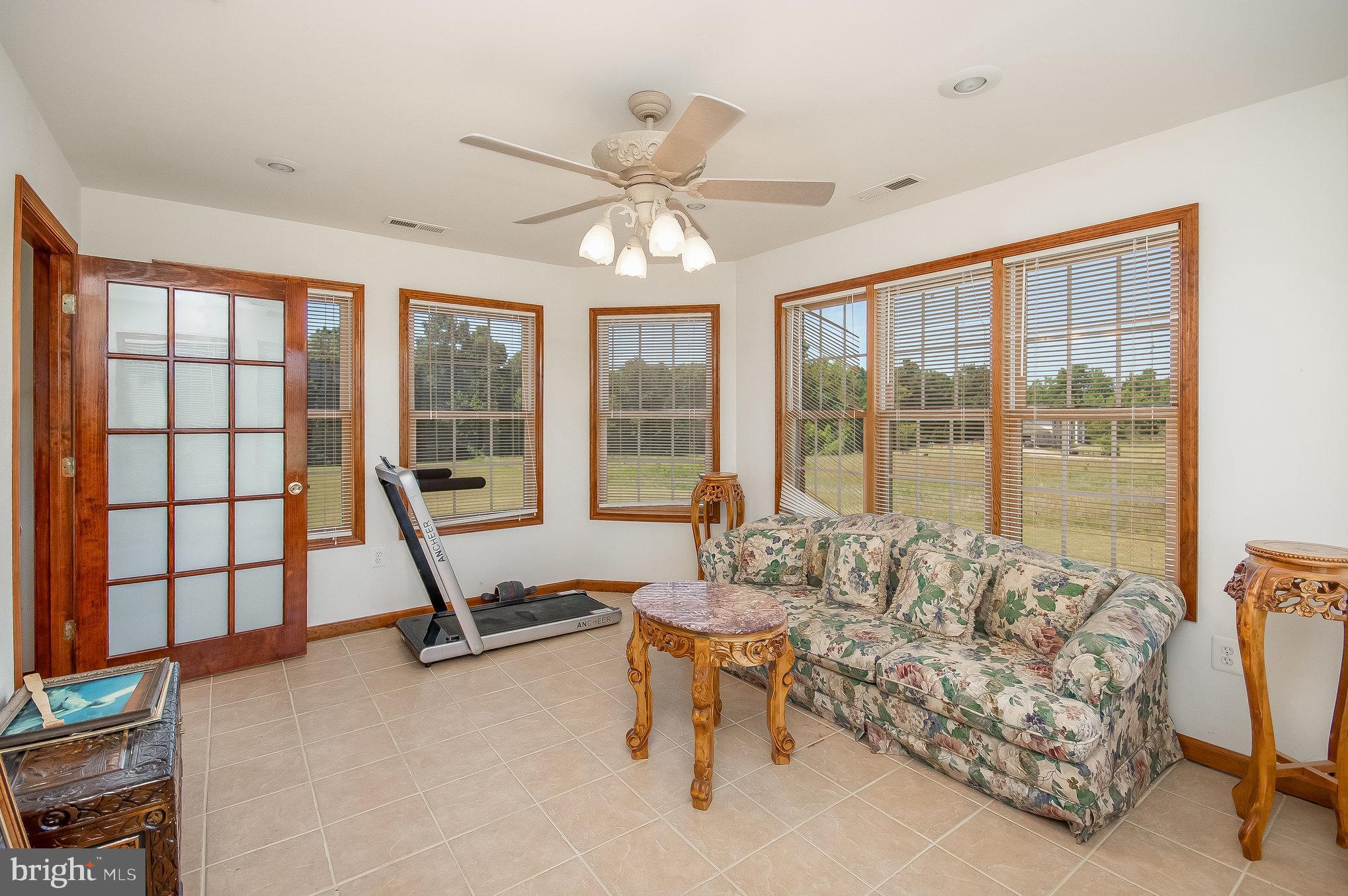 11425 Custers Trace Spotsylvania, VA 22553 - Photo 29 of 60 a living room with furniture and a flat screen tv