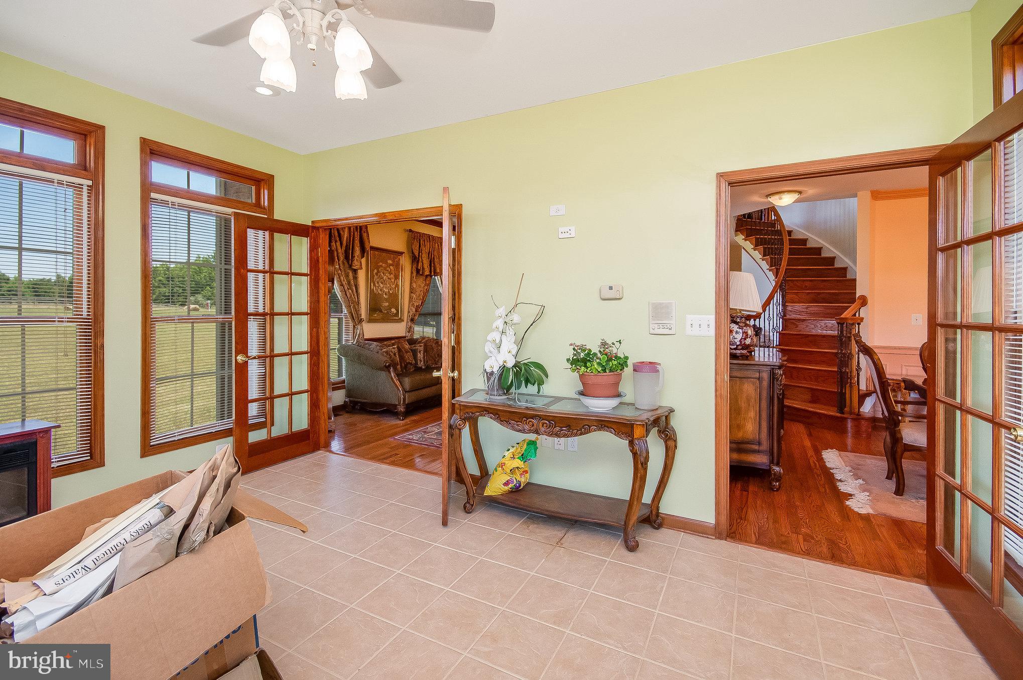 11425 Custers Trace Spotsylvania, VA 22553 - Photo 3 of 60 a view of a livingroom with furniture and a window