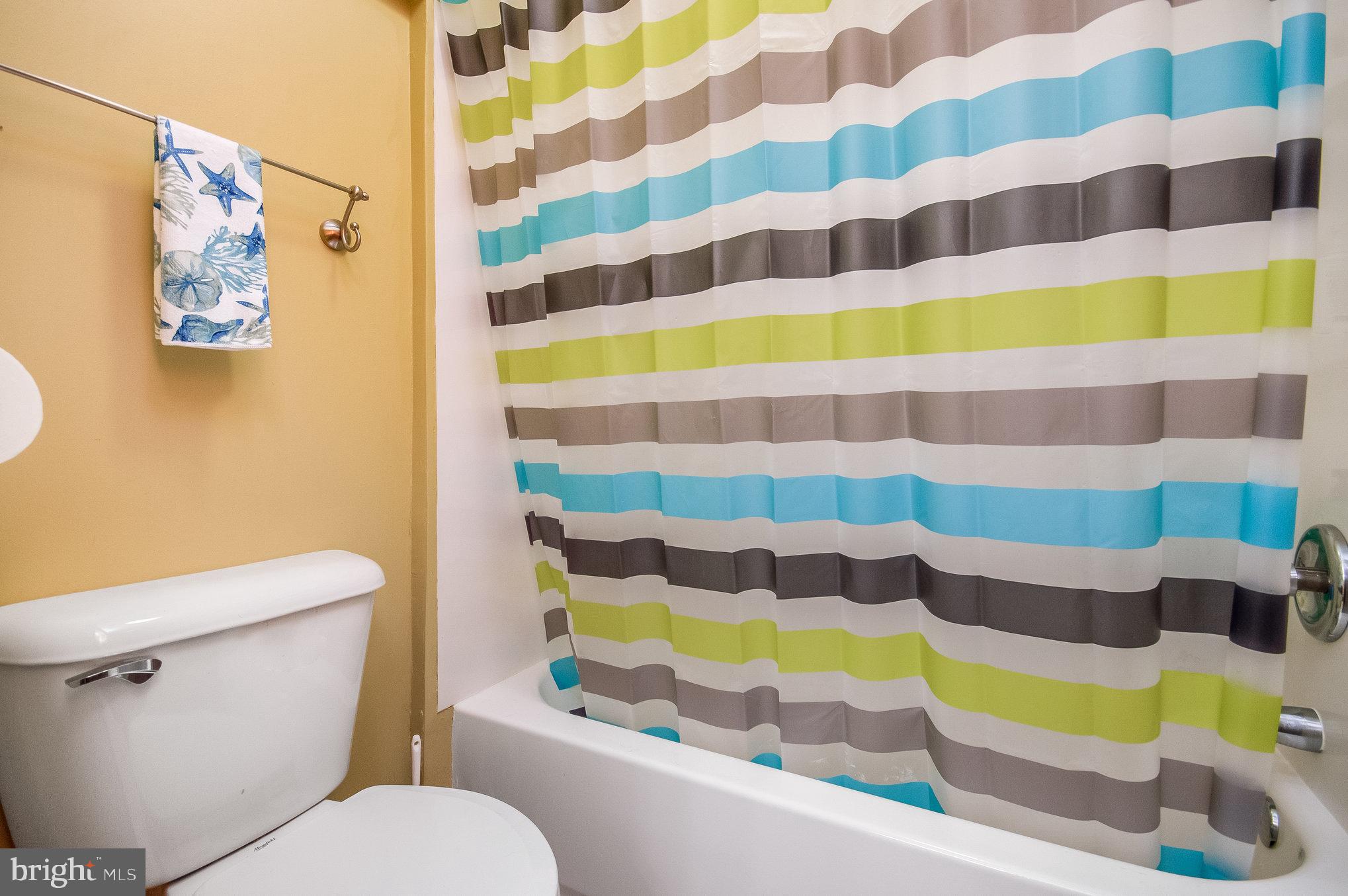 11425 Custers Trace Spotsylvania, VA 22553 - Photo 36 of 60 a bathroom with a bathtub and a toilet