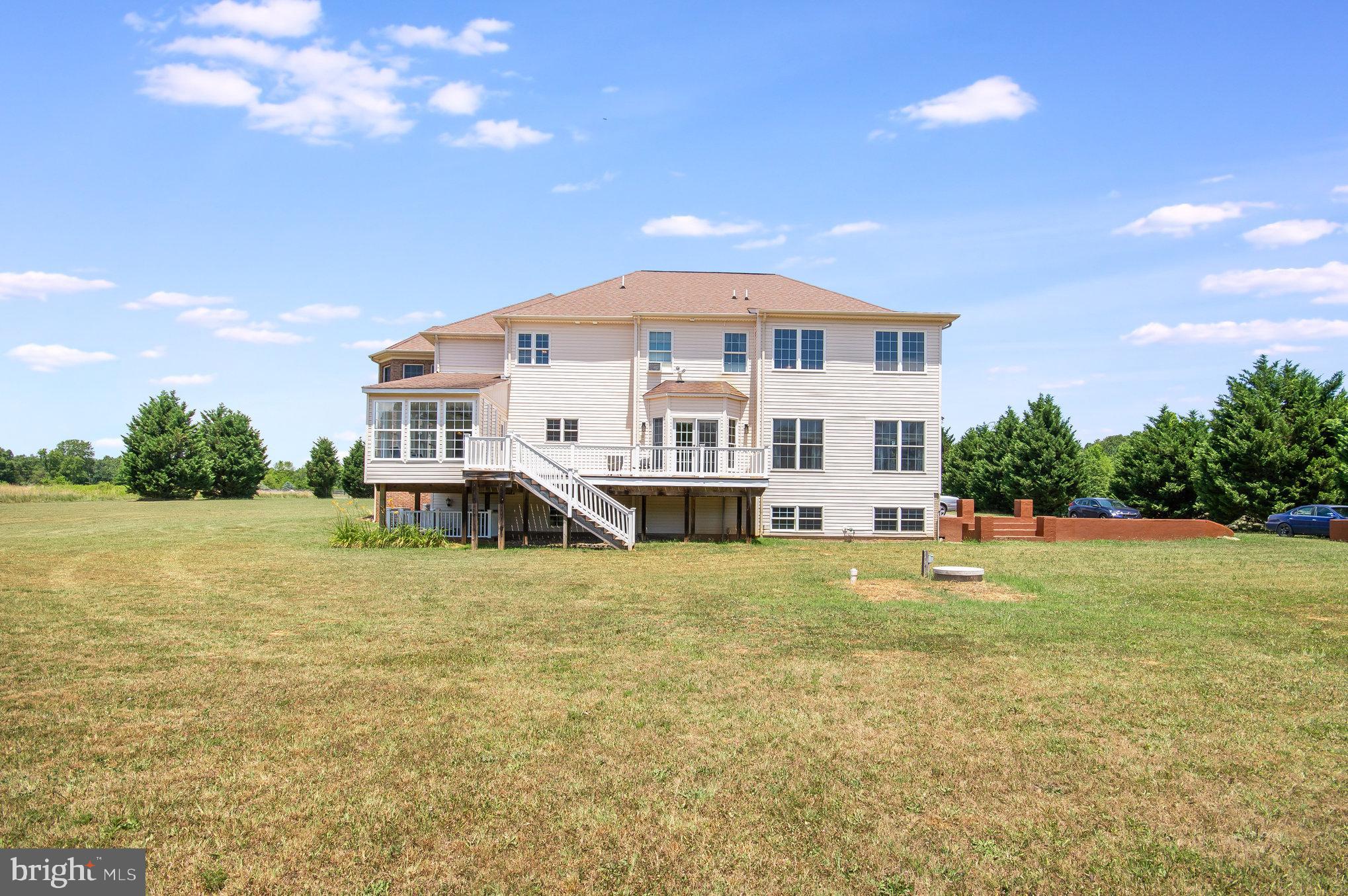 11425 Custers Trace Spotsylvania, VA 22553 - Photo 53 of 60 a view of a house with a yard and sitting area
