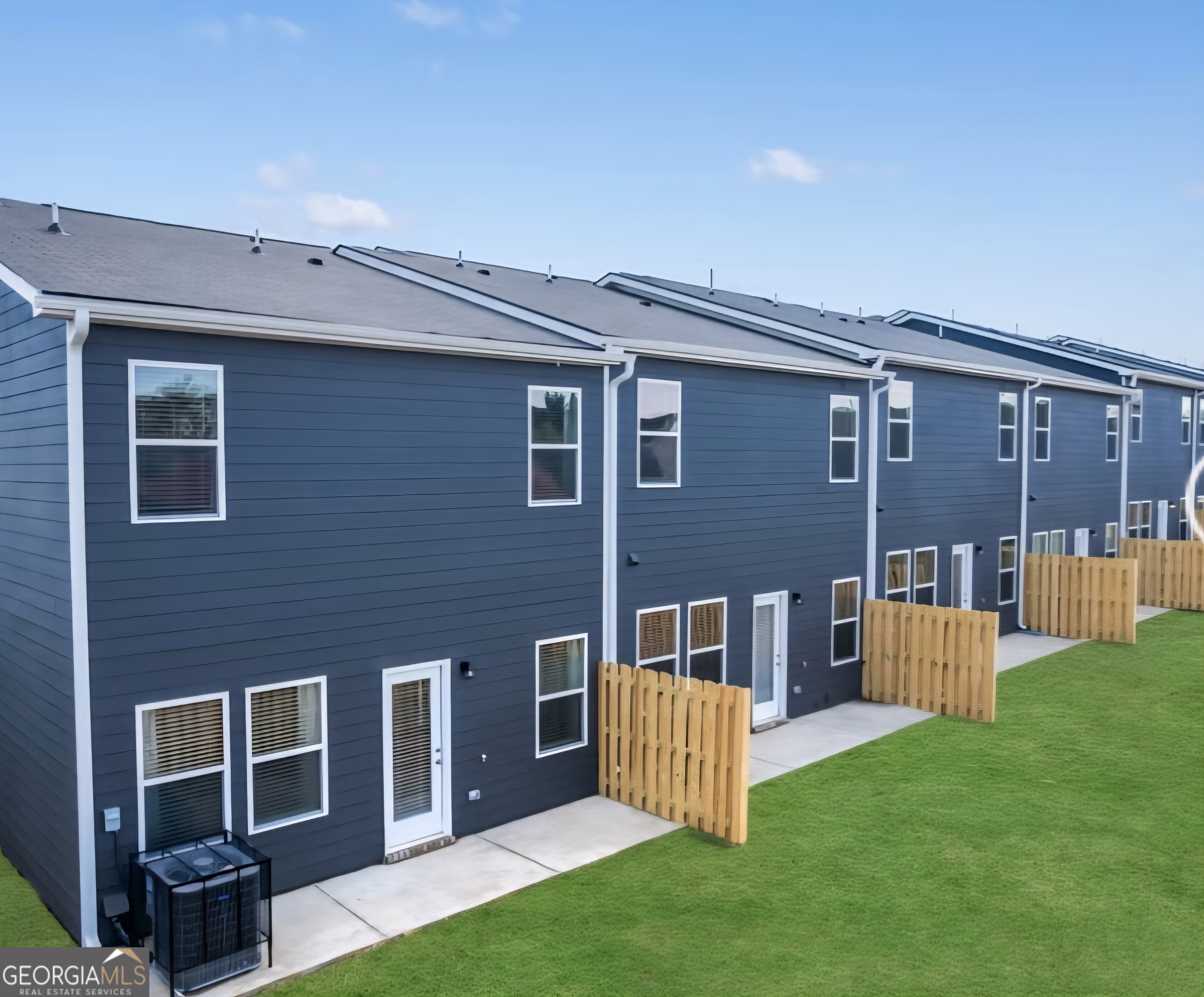 11536 Kimberly Way Hampton, GA 30228 - Photo 4 of 15 a front view of a house with garden