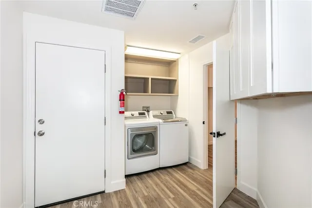 a view of utility room and washer dryer