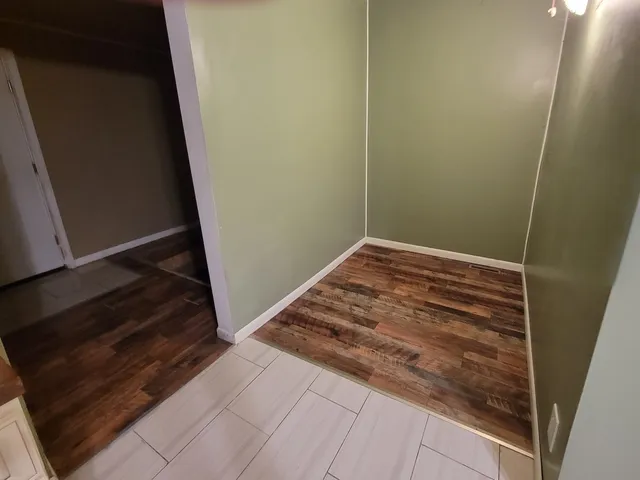 an empty room with a door