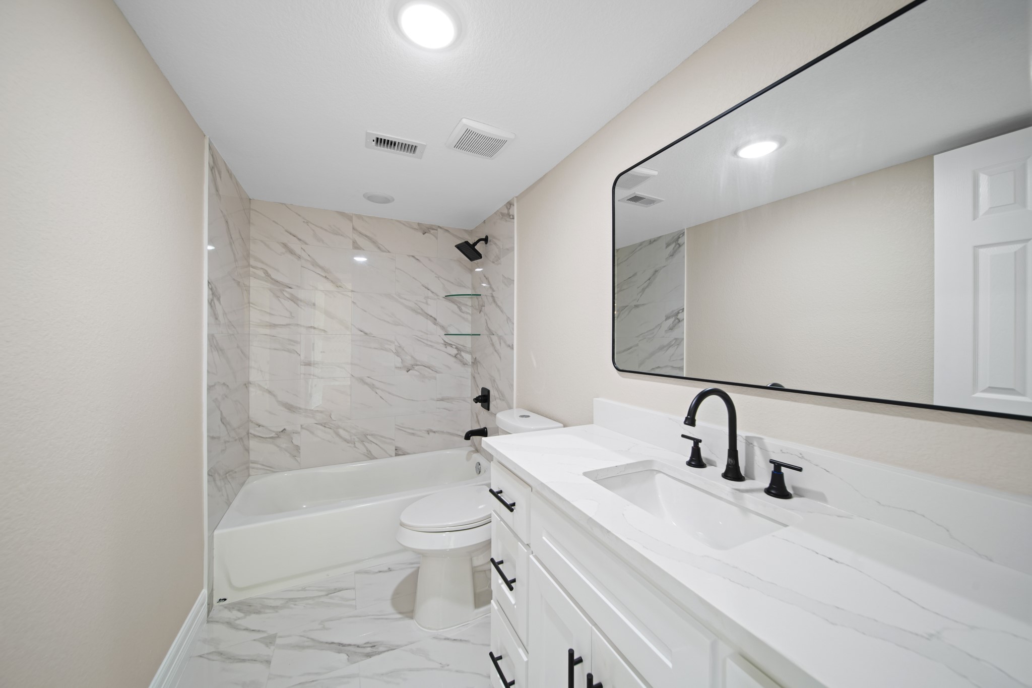 220 Pine Road Clear Lake Shores, TX 77565 - Photo 19 of 31 a bathroom with a sink toilet and shower