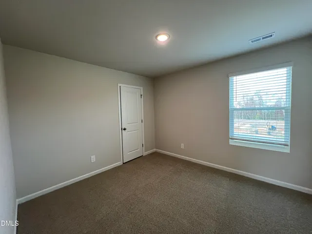 an empty room with window