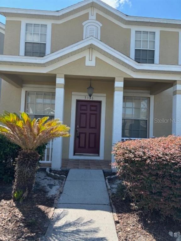 3336 Santa Rita Lane Land O Lakes, FL 34639 - Photo 2 of 60 a front view of a house