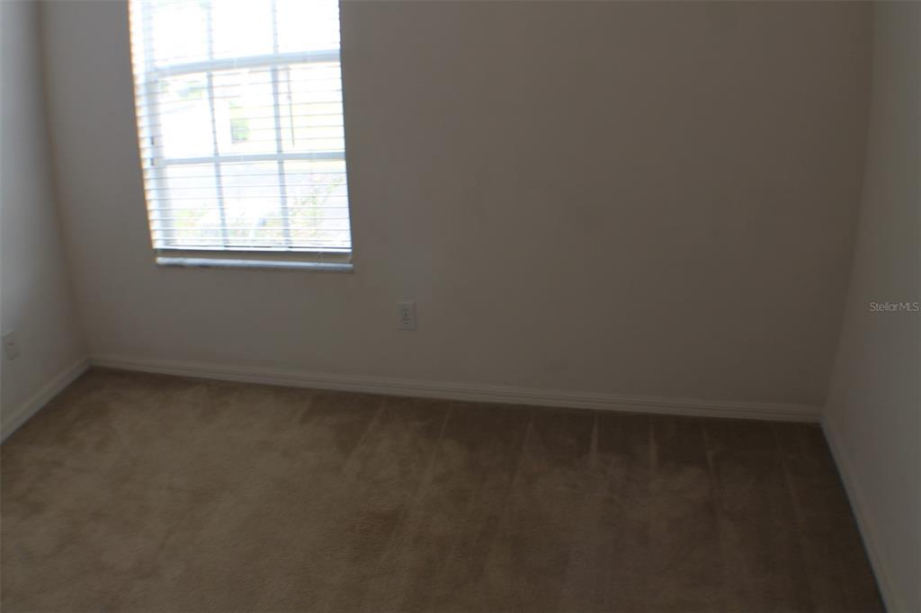 3336 Santa Rita Lane Land O Lakes, FL 34639 - Photo 27 of 60 an empty room with a window