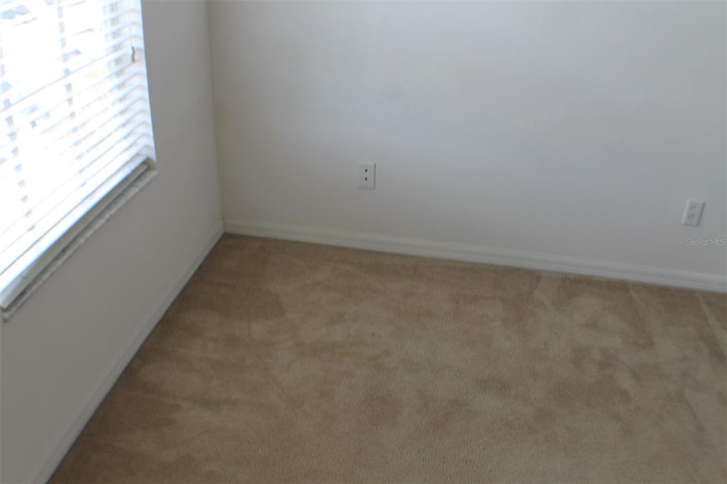 3336 Santa Rita Lane Land O Lakes, FL 34639 - Photo 29 of 60 an empty room with a window