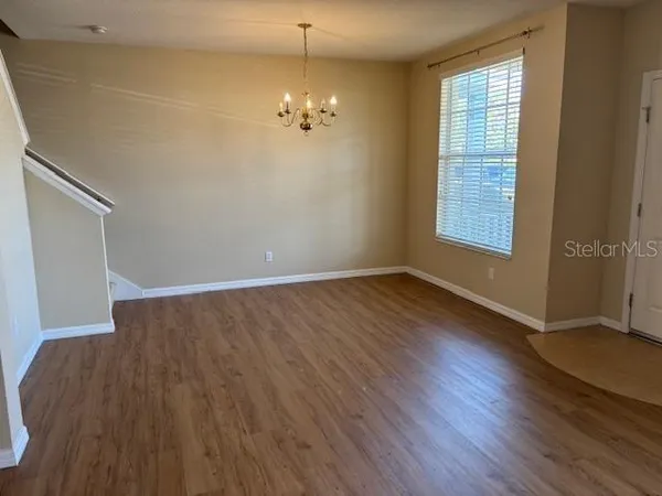 a view of a livingroom with wooden floor