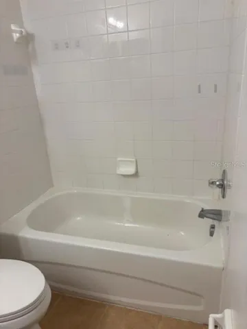 a kitchen with a stove and a microwave