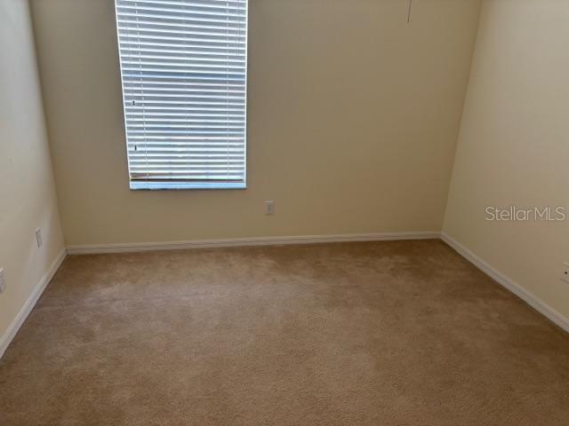 3336 Santa Rita Lane Land O Lakes, FL 34639 - Photo 37 of 60 an empty room with a window