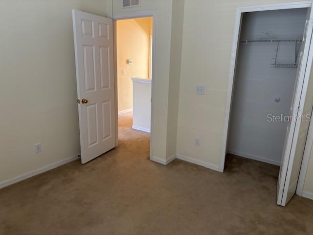3336 Santa Rita Lane Land O Lakes, FL 34639 - Photo 38 of 60 an empty room with windows